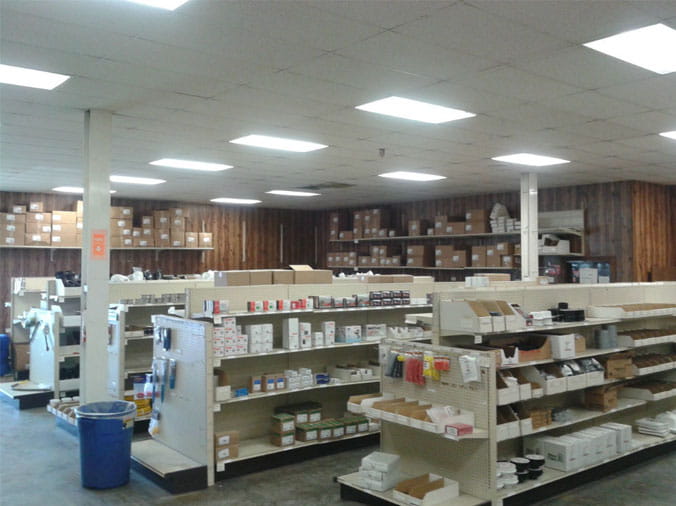 Shelves stocked with plumbing supplies at Dahl Sterling CO